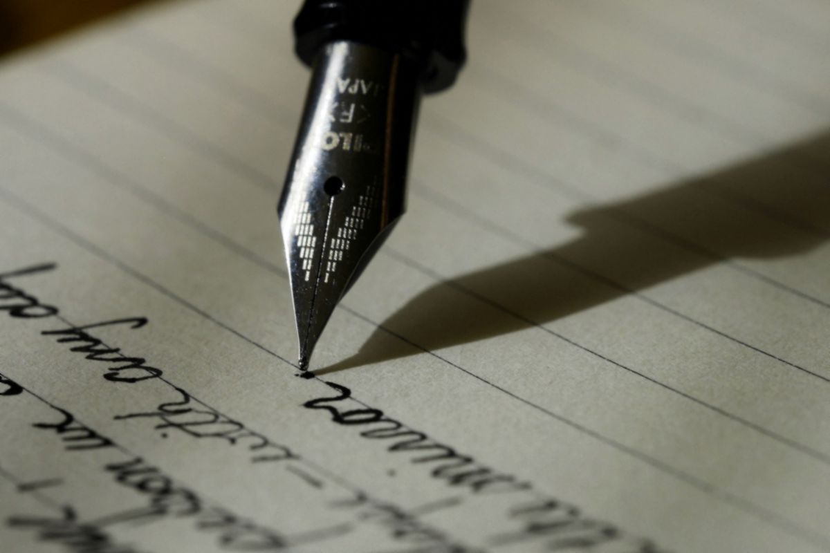 Handwritten research notes on a working desk